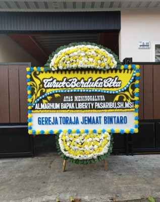 Papan Bunga Duka di Iniye